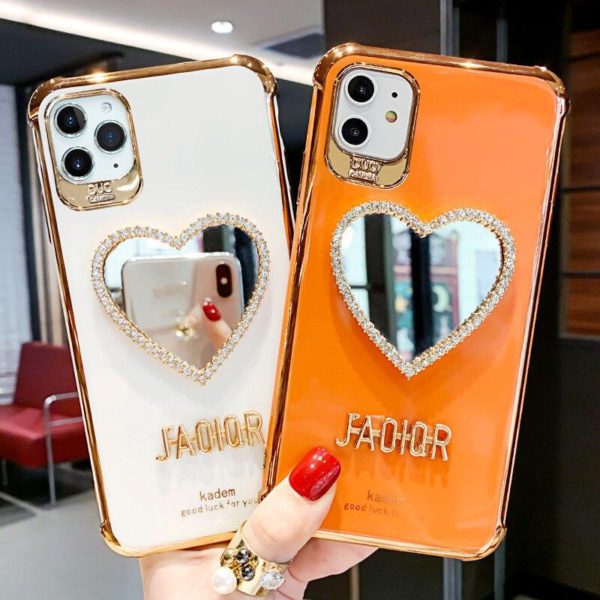 2021 Bag-ong Luxurious Airbag Protection iPhone Case nga May Bling Heart shaped Mirror Hairball