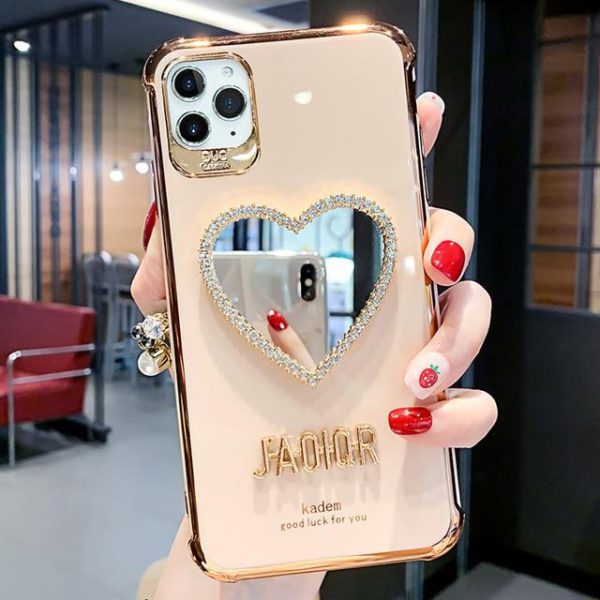 ກໍລະນີ iPhone ປ້ອງກັນຖົງລົມນິລະໄພຫຼູຫຼາໃໝ່ລ່າສຸດປີ 2021 ທີ່ມີກະຈົກຮູບຫົວໃຈ Bling Heart
