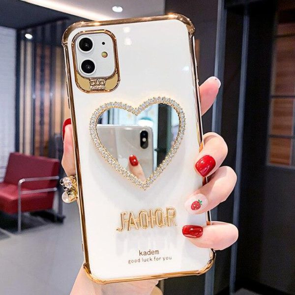 ກໍລະນີ iPhone ປ້ອງກັນຖົງລົມນິລະໄພຫຼູຫຼາໃໝ່ລ່າສຸດປີ 2021 ທີ່ມີກະຈົກຮູບຫົວໃຈ Bling Heart
