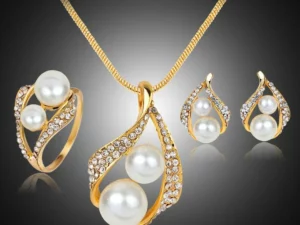 Three-piece Set Of Earrings Necklaces Rings And Pearls
