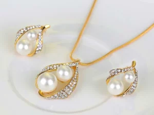 Three-piece Set Of Earrings Necklaces Rings And Pearls