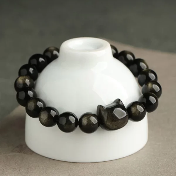 Sumisipsip ng Negatibong Enerhiya Gold Silver Sheen Obsidian Cute Cat Protection Bracelet